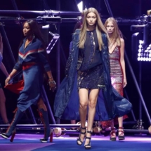 Models Gigi Hadid and Naomi Campbell present creations at the Versace fashion show during Milan Fashion Week Spring/Summer 2017 in Milan